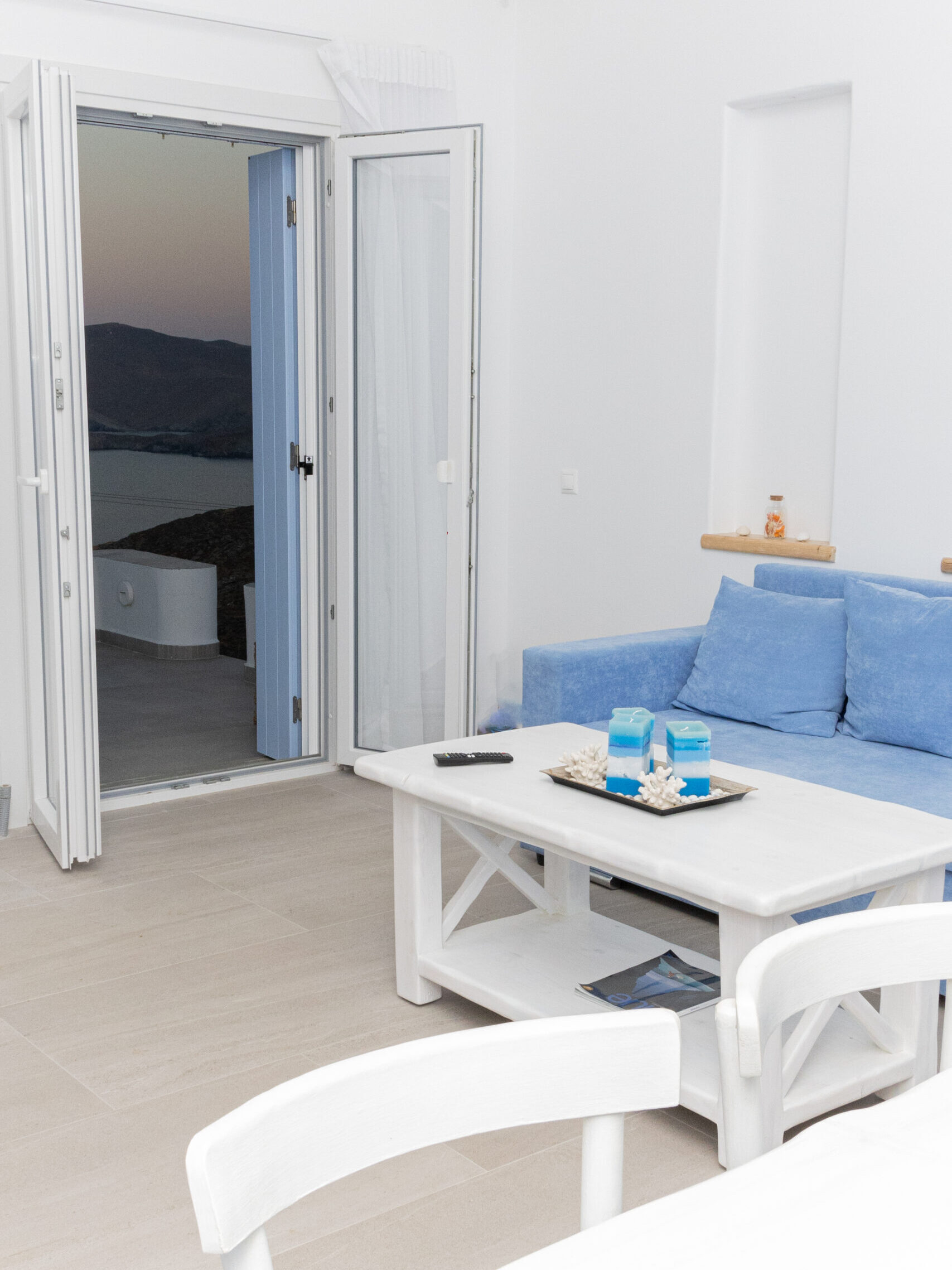 Living room opening to sea views at Villa Manesi